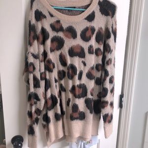 Animal sweater size large. Worn 2-3xs.